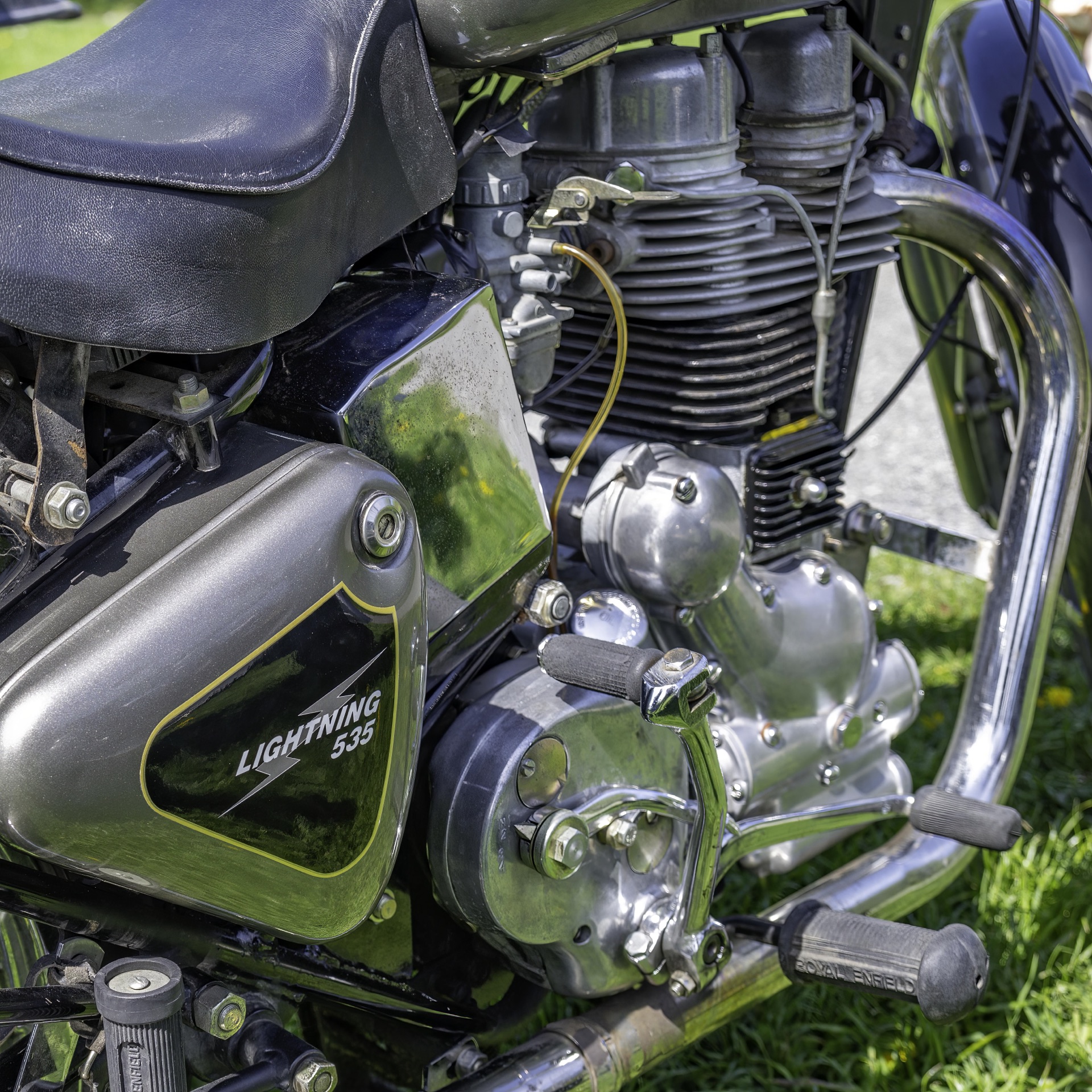 Close-up of a green electric scooter